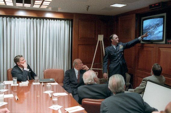 President_Ronald_Reagan_being_briefed_by_the_National_Security_Council_staff.jpeg